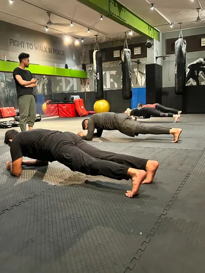 I am always watching, ensuring proper form and pushing my students to hold on for that extra second. This discipline in training is what builds true mental and physical fortitude.