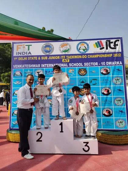 A group of our young champions receiving their awards at the Delhi State Championship.