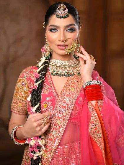 A close-up that shows the sharp, bold fox-winged eyeliner and the perfectly sculpted features. This look is all about creating a grand and striking bridal statement.