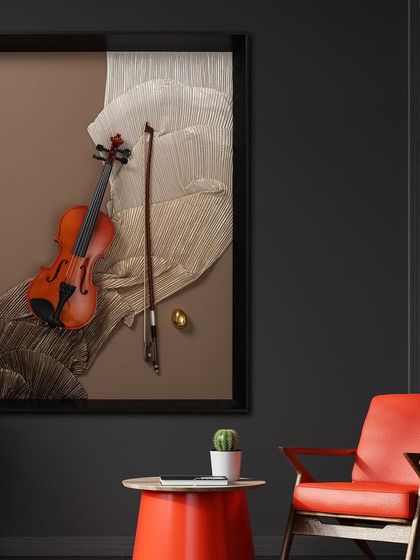 An elegant shadow box featuring a realistic, protruding miniature violin and bow against a backdrop of pleated fabric. The rich brown and cream tones give this piece a classic and timeless feel.