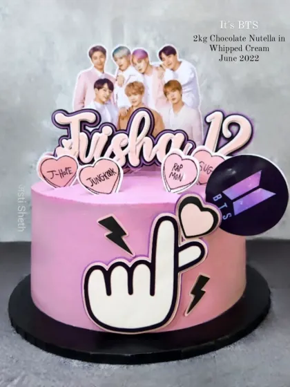 A BTS-themed cake for a 12th birthday, featuring the popular K-pop group. This is a 2kg Chocolate Nutella cake in whipped cream.