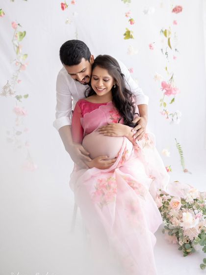 Another beautiful variation of the couple's portrait amidst falling flowers. Their comfortable and loving pose makes this image feel so natural and heartfelt.