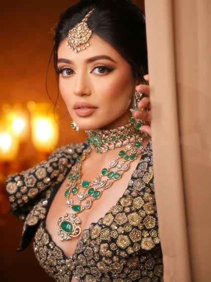 A peek from behind the curtain. This shot is mysterious and alluring, with the focus on the stunning eye makeup.