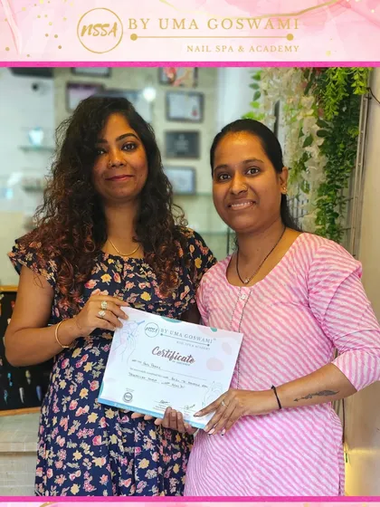 A moment of achievement for Preeti as she receives her certificate. Every student's success is a milestone for the academy.