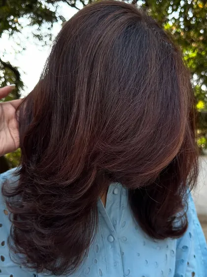 A beautiful blend of 'Mahogany & Plum'. The deep red of the mahogany and the cool tones of the plum create a unique, multi-faceted color that looks different in every light.