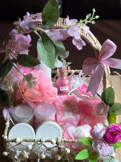 Another view of the fully assembled engagement hamper, showcasing the floral decorations and the variety of handmade bath and body products inside.