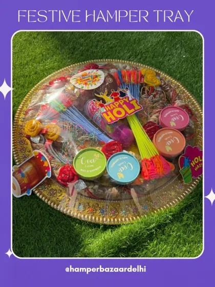 A top down view of our packed Holi hamper tray, showing the abundance of goodies inside. It's a feast for the eyes and the taste buds!