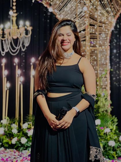 A candid smile during a Sangeet night. The warm lighting and happy atmosphere are my favourite parts of the job.