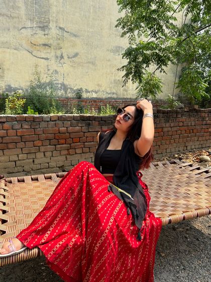 A stylish pose on the charpai. This shows how I can find fashion moments anywhere.