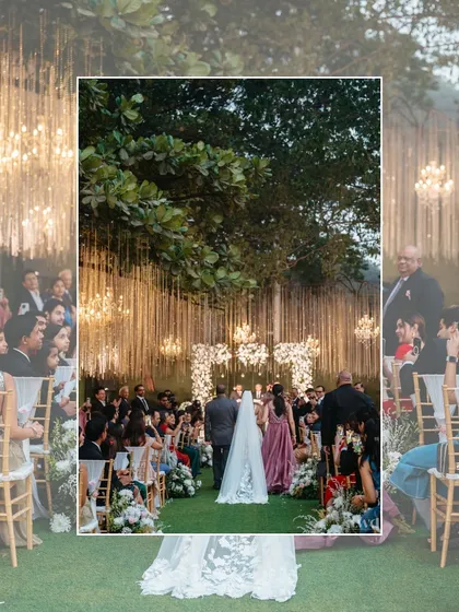 A beautiful shot from behind, showing the bride and her parents walking down the aisle towards the stunningly decorated altar.