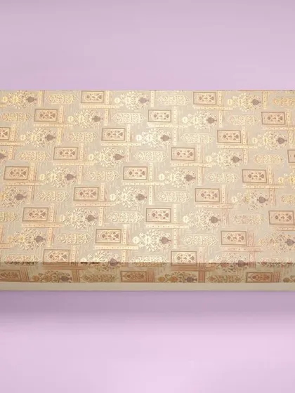 A rectangular gift box with a traditional gold pattern, shot against a solid pastel background. We use colored backgrounds to make catalogue images more vibrant.