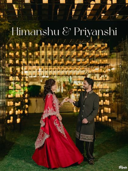 Against a wall of a thousand candles, the couple shares a quiet moment. This portrait from a Sufi night at Rambagh Palace uses the warm, flickering light to create an atmosphere of intimacy and romance amidst the grandeur.