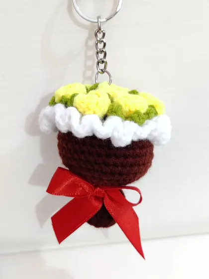 My most popular item, the mini bouquet keychain. I create these in various flower types like roses and sunflowers, and in a wide range of color combinations.