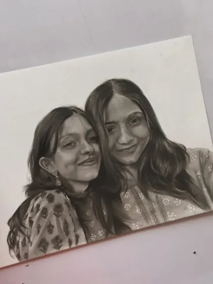 Another view of the finished double portrait, showcasing the realistic details in the hair and clothing.