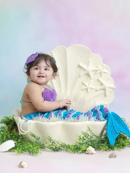 Let your child's imagination swim free with our enchanting mermaid theme. We use vibrant, custom made costumes and an under the sea backdrop to bring this fairy tale to life.