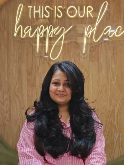 A gorgeous layered haircut on long, thick hair. The layers add volume and movement, creating a glamorous, flowing look.