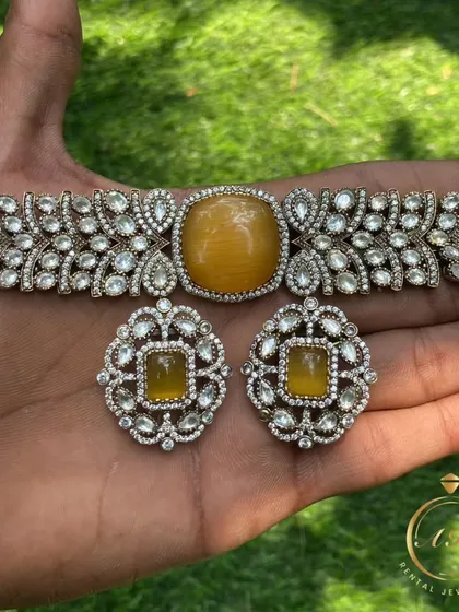 This Victorian choker with a large yellow stone is a unique and stylish choice. It's perfect for making a statement.