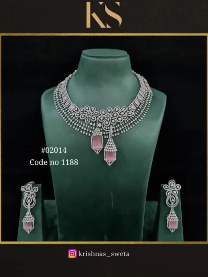 This version of the floral American diamond set features soft pink drops. It's a romantic and feminine choice, perfect for an engagement or reception.