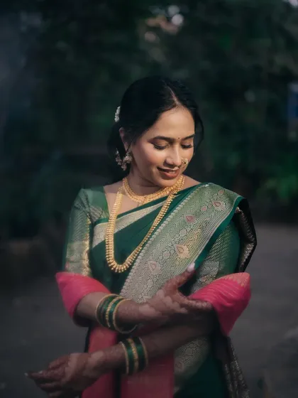 A quiet moment of reflection for the bride. The soft glam makeup enhances her features without overpowering her natural beauty.