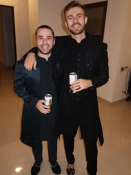 Our international clients looking dapper in our rental sherwanis. We have options for everyone, ensuring you fit right in at any Indian celebration.