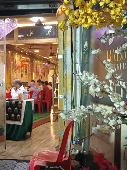 A peek into our banquet hall from the entrance during a Ramadan evening. The warm lighting and decorated interior create a welcoming atmosphere for all our guests.