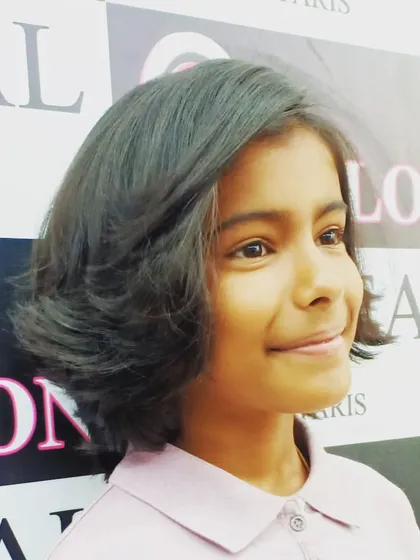 A chic and modern short bob haircut for a young client. This style is easy to manage and always looks stylish.