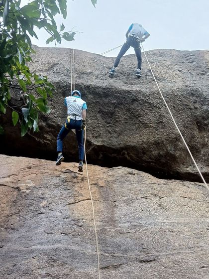 We provide specialized adventure training for various organizations, including this rock climbing and rappelling camp for Indian Air Force personnel at Ramanagara.