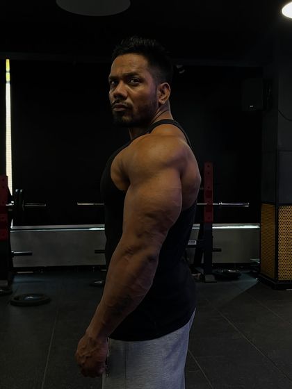 Another angle of the arm pose. The battle is won in the gym, every single day.