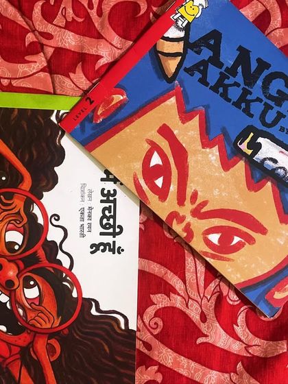 The books 'Angry Akku' and its Hindi version. We use stories like these to help children understand and navigate complex emotions like anger in a healthy way.