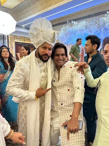 Attending a friend's wedding and celebrating with the groom. It's wonderful to be a guest sometimes and just enjoy the celebration.