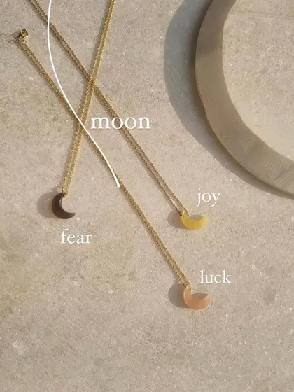 My Luna moon pendants, each with a unique purpose. Smoky quartz for fear, yellow opal for joy, and peach moonstone for luck. Choose the energy you want to call into your life.