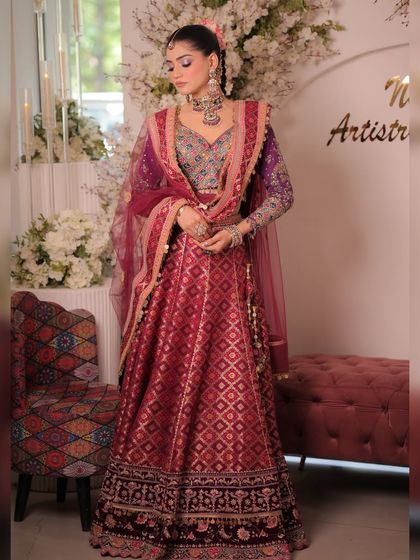 The full look of the multi-colored silk lehenga. The rich fabrics and detailed embroidery make it a perfect outfit for a grand sangeet or even a wedding.