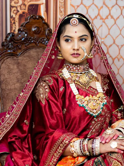 For brides who dream of a regal, majestic look, we offer styled portrait sessions. This image, inspired by royal aesthetics, showcases our ability to capture intricate details in bridal wear, jewelry, and expression, creating a timeless piece of art.