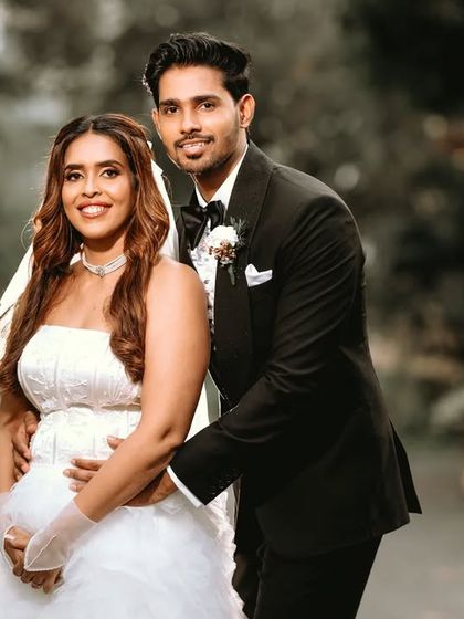 A classic, elegant portrait of the bride and groom. This timeless shot is a must-have for any wedding album.