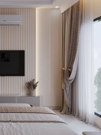A shot of the TV wall with its vertical fluting, demonstrating a consistent use of texture throughout the space.
