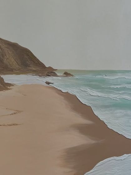 The minimalist beach painting in my studio before framing. The composition is simple and calming, focusing on the gentle meeting of sand, sea, and sky.