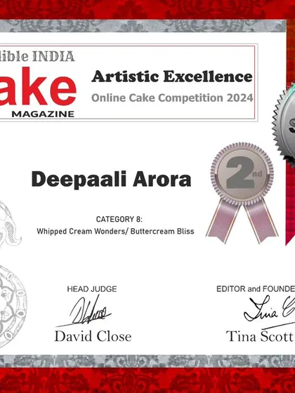 I am honored to be recognized for my craft. This certificate marks my achievement as a Silver award winner in a global cake competition, specifically for my work with whipped cream. It's a validation of the passion and dedication I pour into every cake.