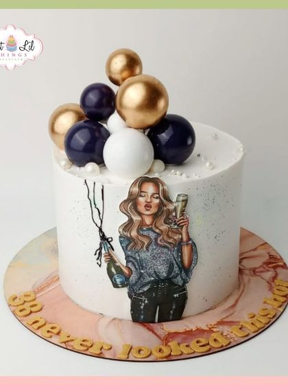 "30 never looked this good." A chic and modern birthday cake for a 30th birthday, featuring a stylish illustration and a cascade of spheres.