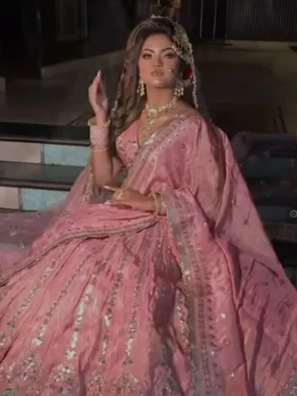 The final look of the pink bridal lehenga, a grand and elegant outfit for the main ceremony.