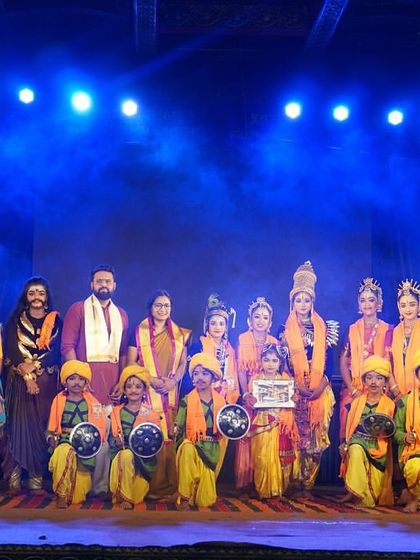 The full cast of "KRISHNA" on stage at the Udupi Sri Krishna Matha. This photo captures the scale of our production and the diversity of characters involved.