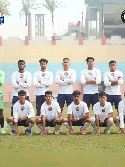 The team that secured a stellar 2-0 win. Pictured here before the match, focused and determined.