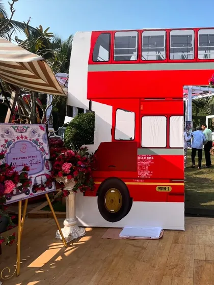To capture the spirit of Mumbai for a Haldi carnival, we brought in iconic elements like this life-sized double-decker bus prop. It served as a fantastic photo opportunity and instantly set a fun, energetic tone for the event.
