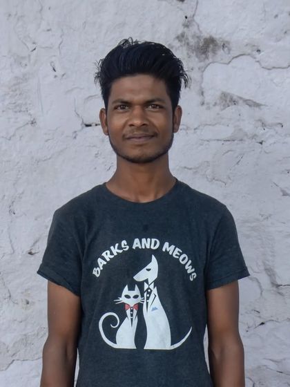 This is Sonu, our cat whisperer. She has a special way with our feline guests and ensures they feel right at home.