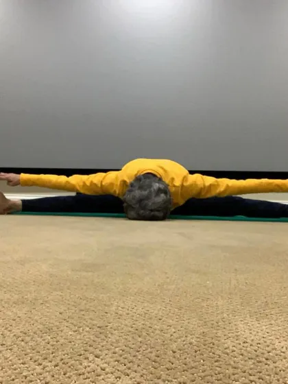 A deep forward bend in a wide-legged seated position. This asana is fantastic for releasing tension in the lower back and inner thighs.