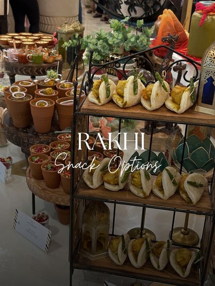 Rakhi snack options that are both traditional and modern. This setup includes paneer baos and individual chaat cups, offering something for everyone.