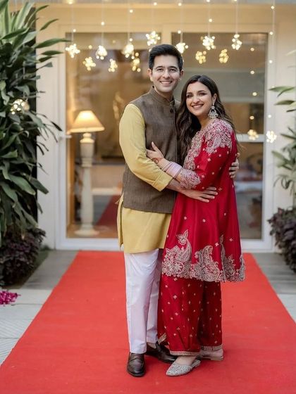 A full-length shot of Parineeti Chopra and Raghav Chadha. The entire look, styled by a talented team including my student, is simply perfect.