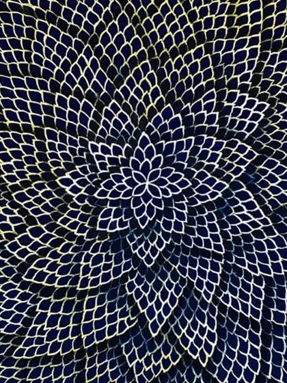 Spirituality in design can be abstract and modern. This intricate, laser-cut floral pattern in deep blue and gold creates a mesmerizing mandala effect, fostering a sense of harmony and positive energy.
