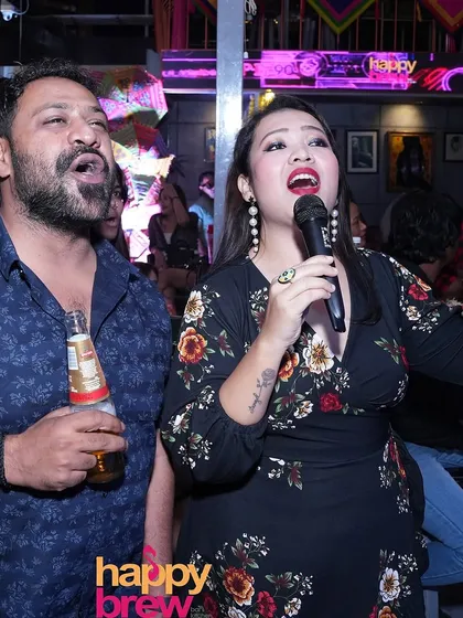 It's all about moments like this. Two people, lost in the song, giving it their all. My karaoke nights are a judgment-free zone for both bathroom singers and stage pros.