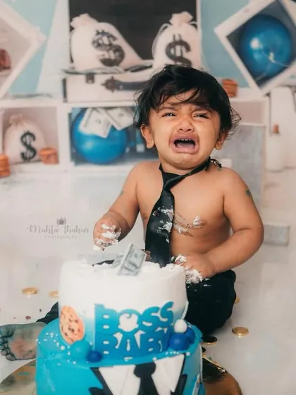 Sometimes, being the boss is tough. Even a little meltdown can make for an authentic and funny photo during a cake smash.