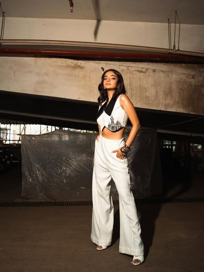 Another shot from the parking garage set, using the strong architectural lines of the space to frame the subject.